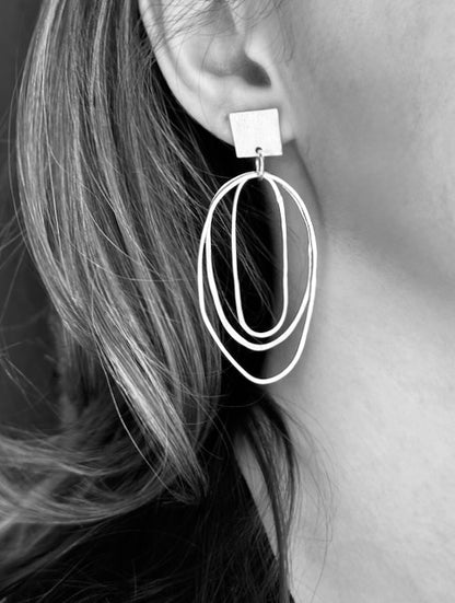 Sculptural Silver Drop Hoop Earrings • Minimalist Statement Design