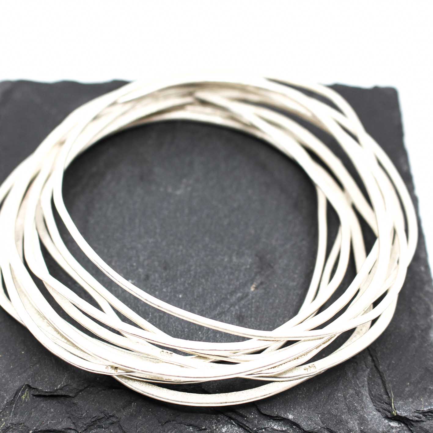 set of 11 stackable silver bangles / bracelets • handmade in 925 Sterling Silver