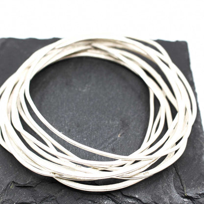 set of 11 stackable silver bangles / bracelets • handmade in 925 Sterling Silver