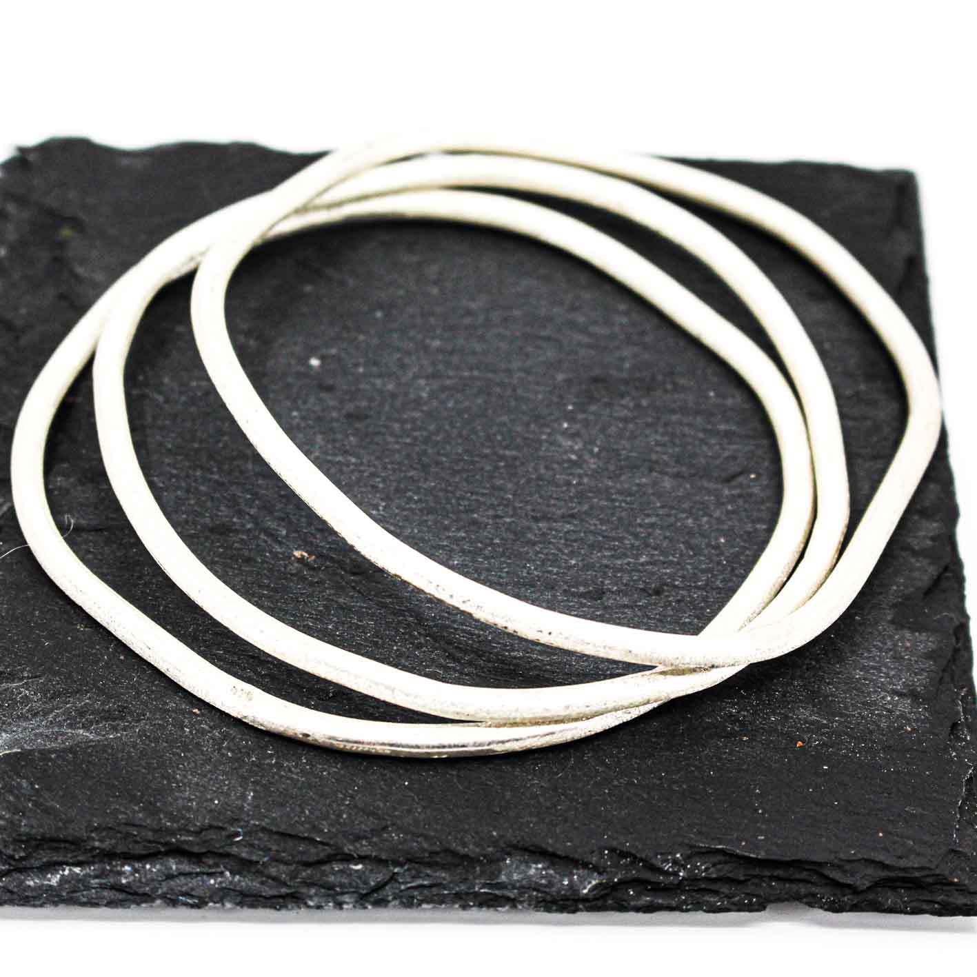 set of 3 stackable silver bangles • sterling silver, free form, textured
