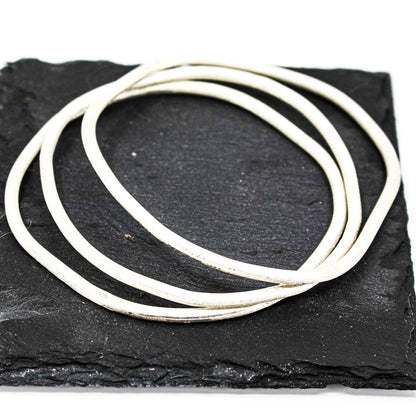 set of 3 stackable silver bangles • sterling silver, free form, textured