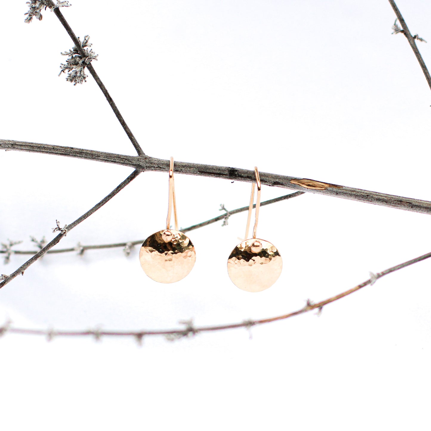golden dangling disc earrings • 14ct gold plated