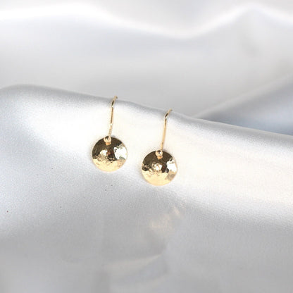 golden dangling disc earrings • 14ct gold plated