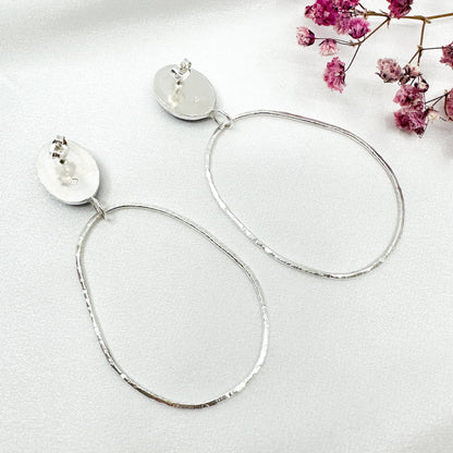 long dangly silver earrings with oval amethyst