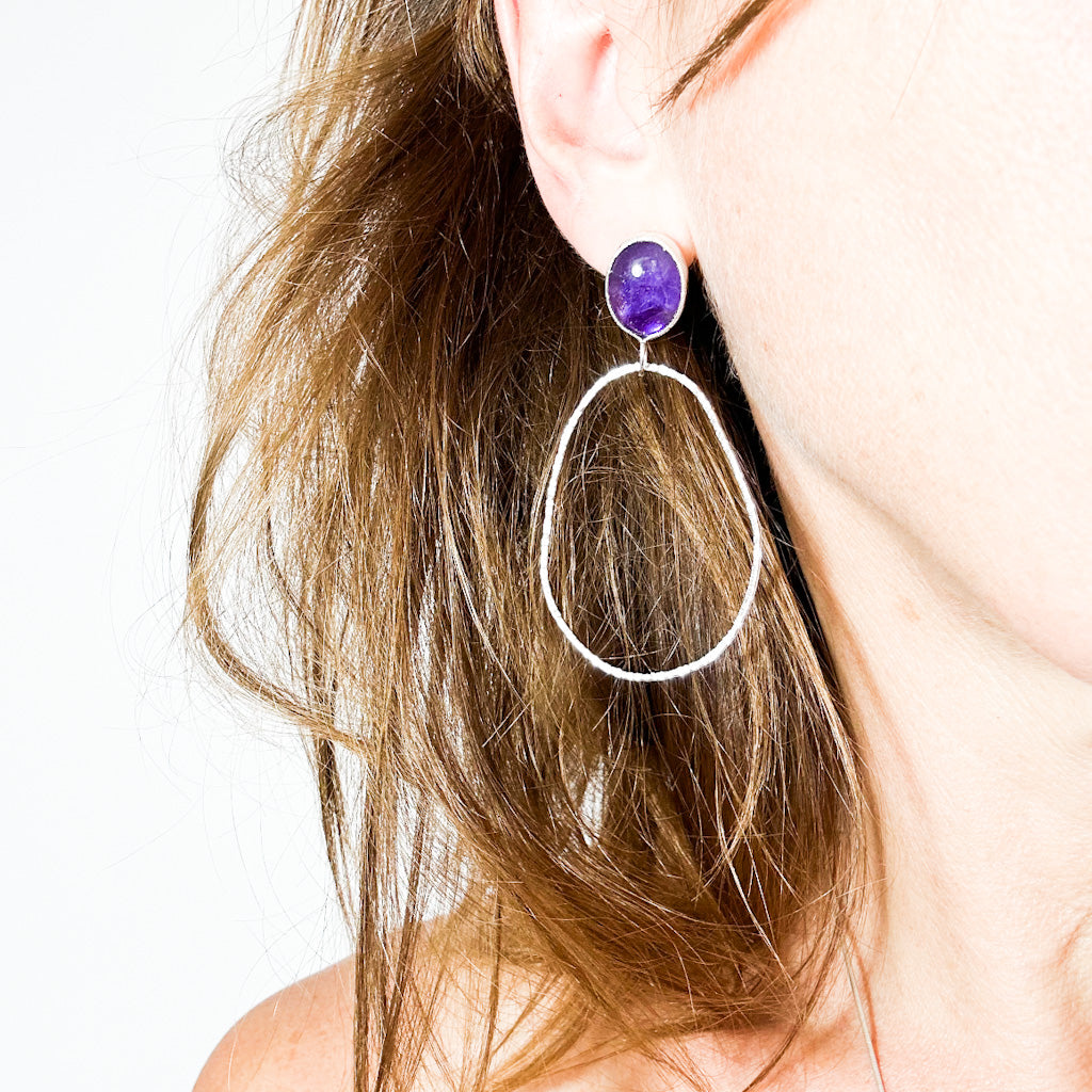 long dangly silver earrings with oval amethyst