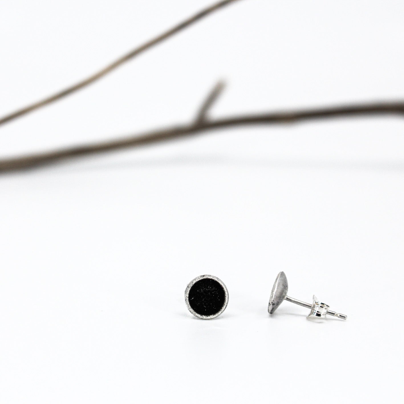 small minimalist round sterling silver stud earrings with white or grey or black resin