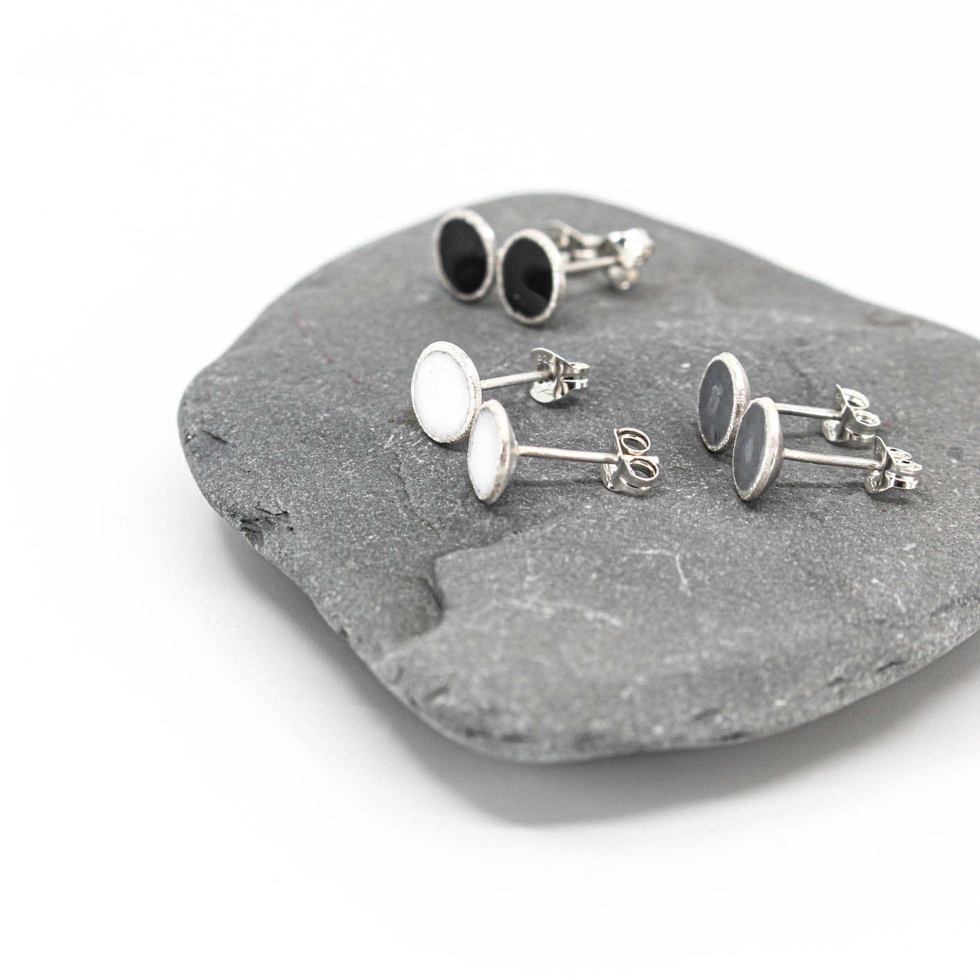 small minimalist round sterling silver stud earrings with white or grey or black resin