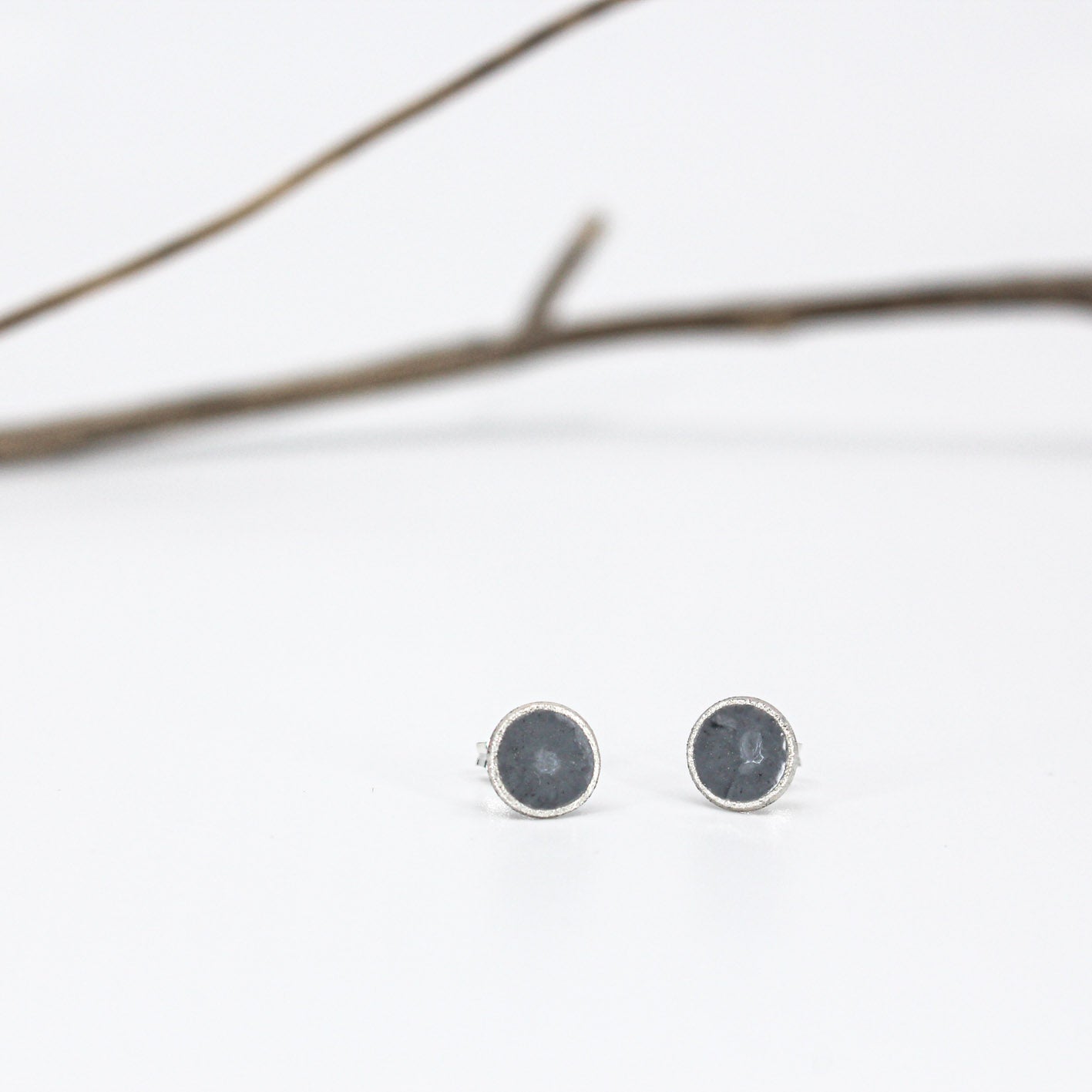 small minimalist round sterling silver stud earrings with white or grey or black resin