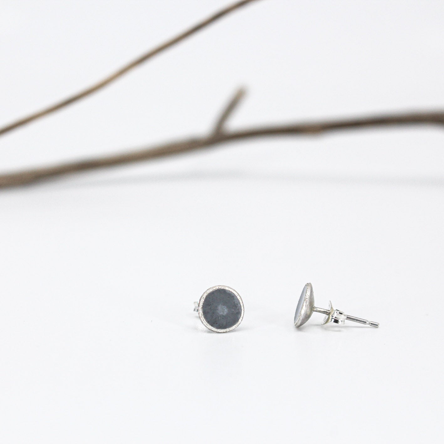 small minimalist round sterling silver stud earrings with white or grey or black resin