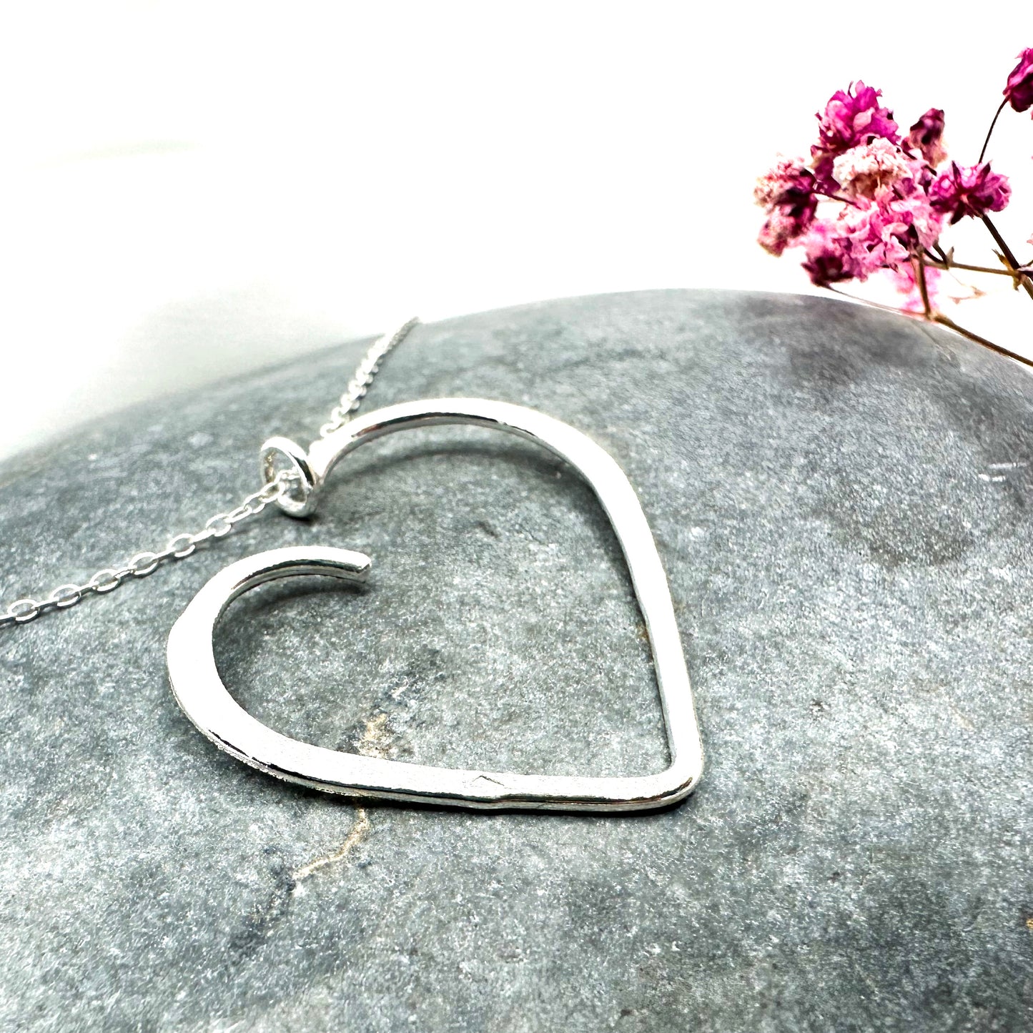 set of sterling silver heart pendant necklace and matching stud earrings