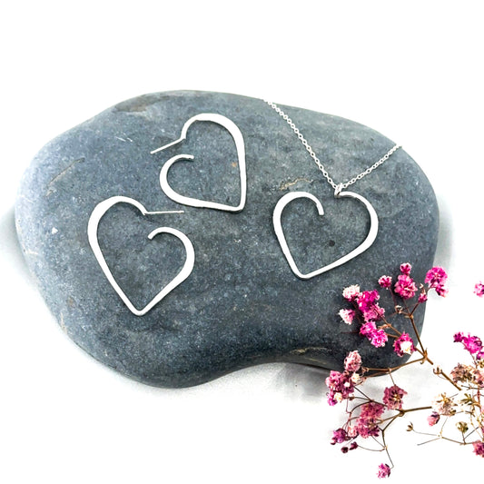 set of sterling silver heart pendant necklace and matching stud earrings