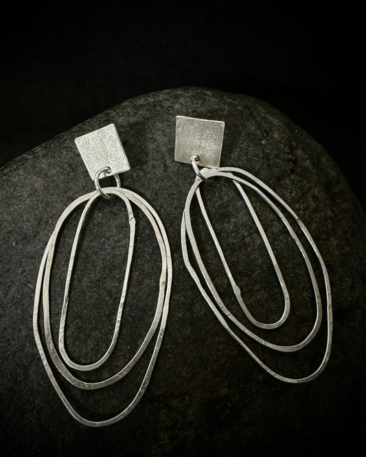 Sculptural Silver Drop Hoop Earrings • Minimalist Statement Design