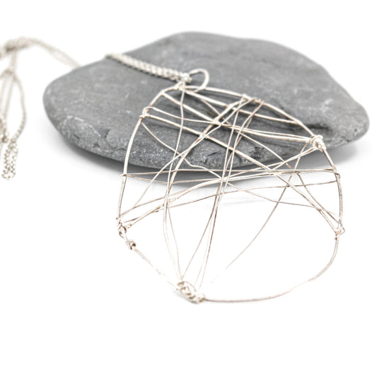 long  statement necklace in 925 eco sterling silver with wing shaped pendant