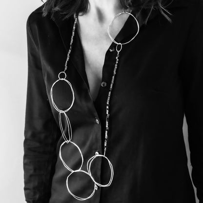 extra long minimalist statement necklace with hematite cubes and sterling silver rings