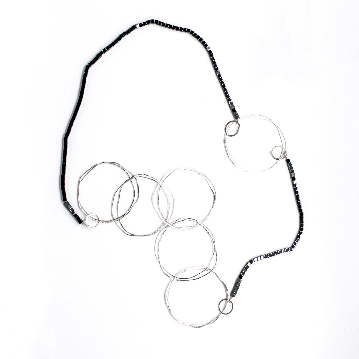 extra long minimalist statement necklace with hematite cubes and sterling silver rings