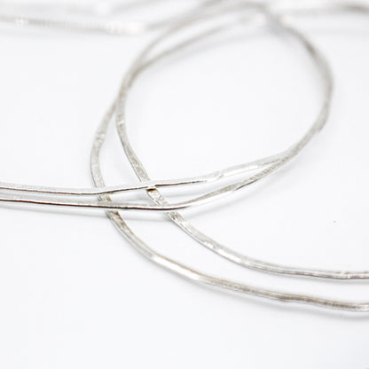 extra long minimalist statement necklace with hematite cubes and sterling silver rings
