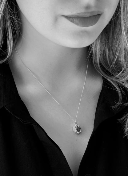 Blue agate pendant necklace worn on model minimalist sterling silver jewellery