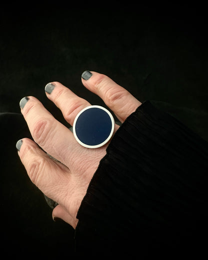 Dark blue resin statement ring in solid 925 sterling silver, on hand