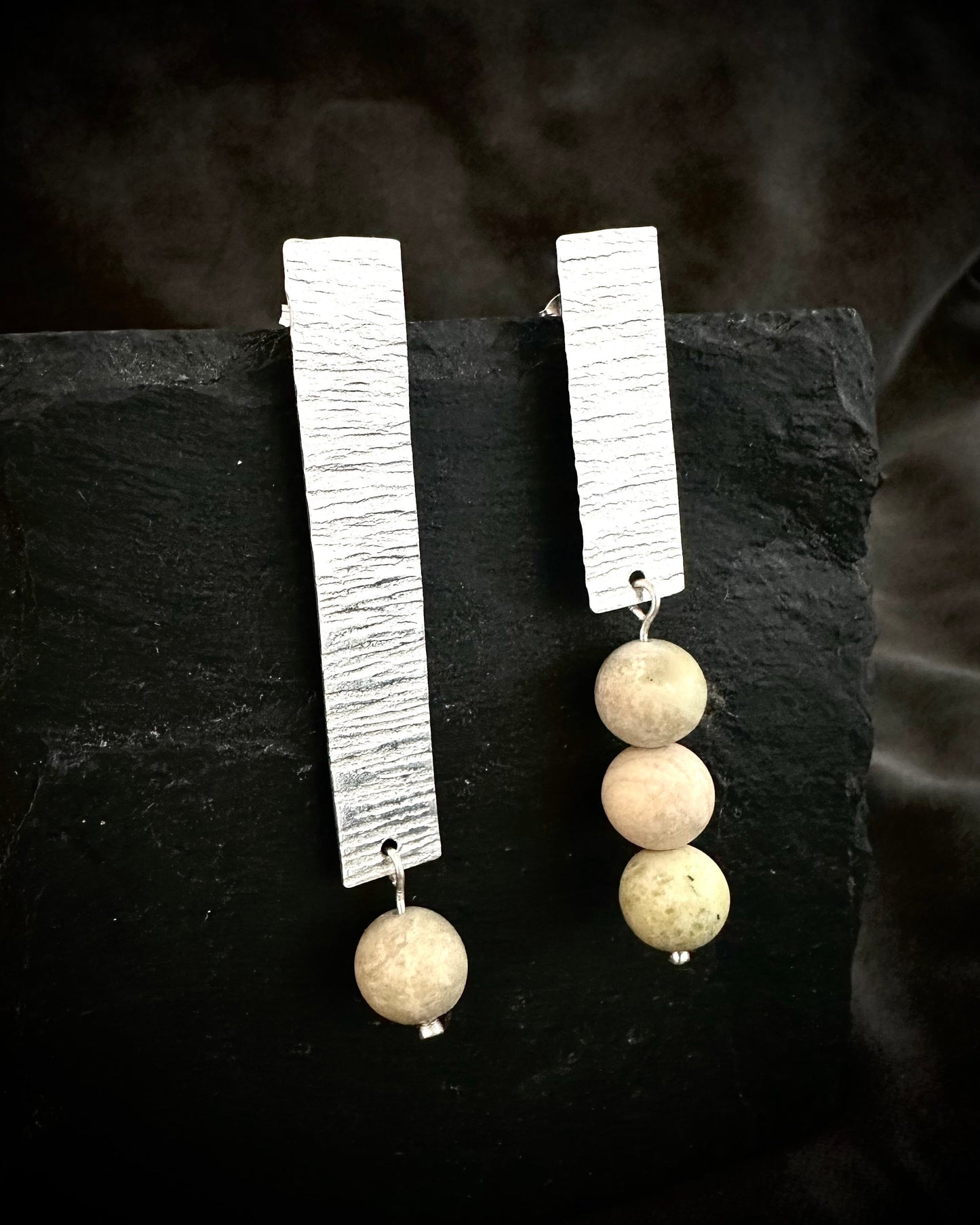 Hammered sterling silver earrings with pale green and beige natural jade beads