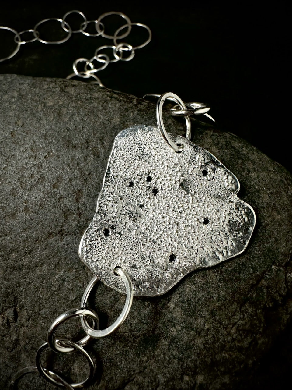 A silver necklace with black diamonds from sabine werner jewellery.