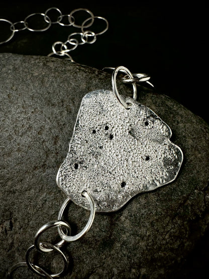 A silver necklace with black diamonds from sabine werner jewellery.