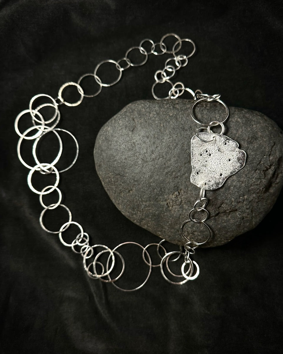 A silver necklace with black diamonds from sabine werner jewellery.