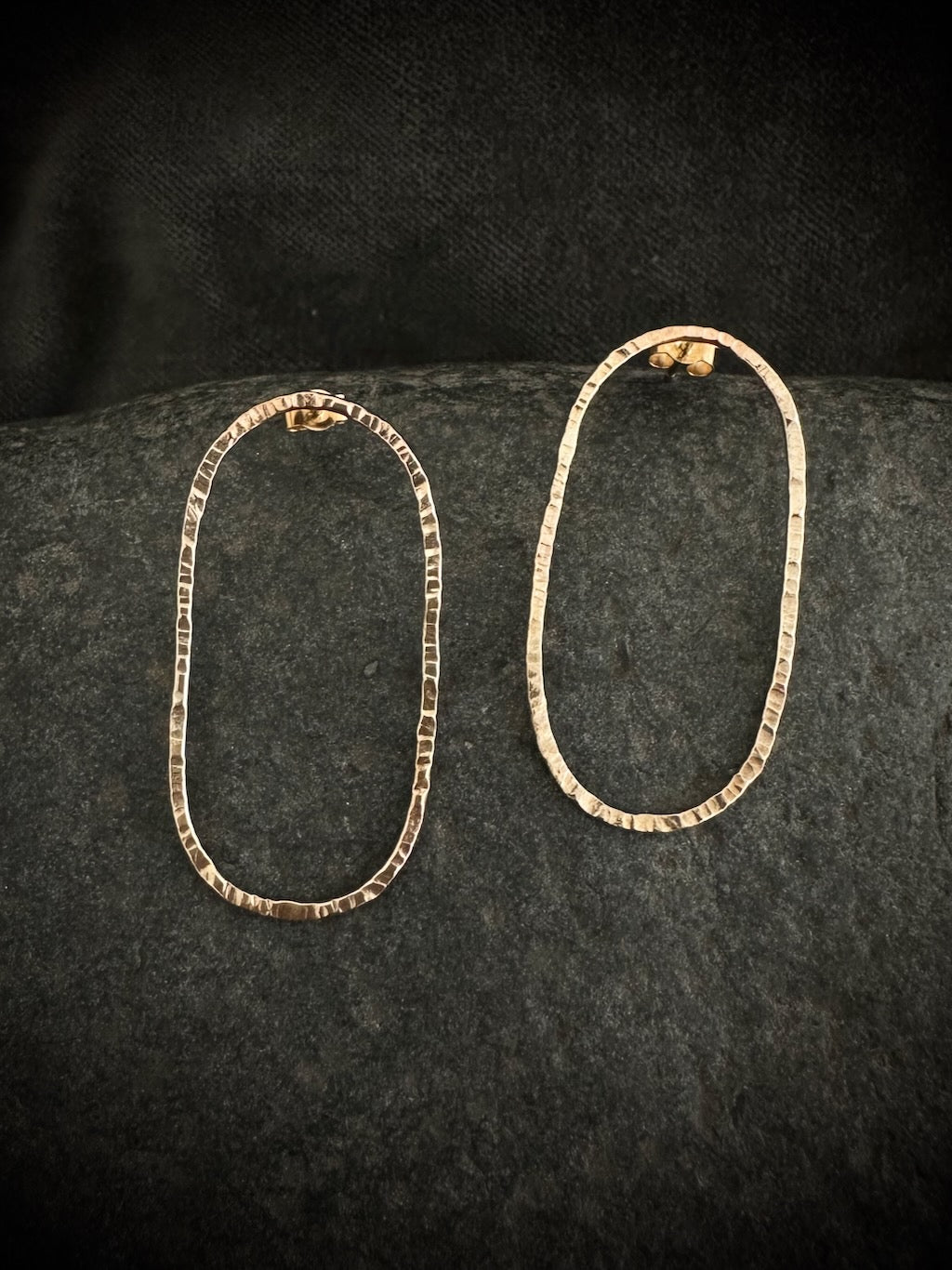 Oval 9ct gold hoop stud earrings on stone - hammered handmade jewelry