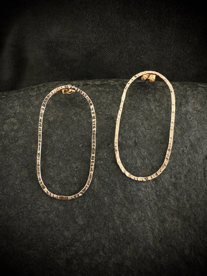 Oval 9ct gold hoop stud earrings on stone - hammered handmade jewelry