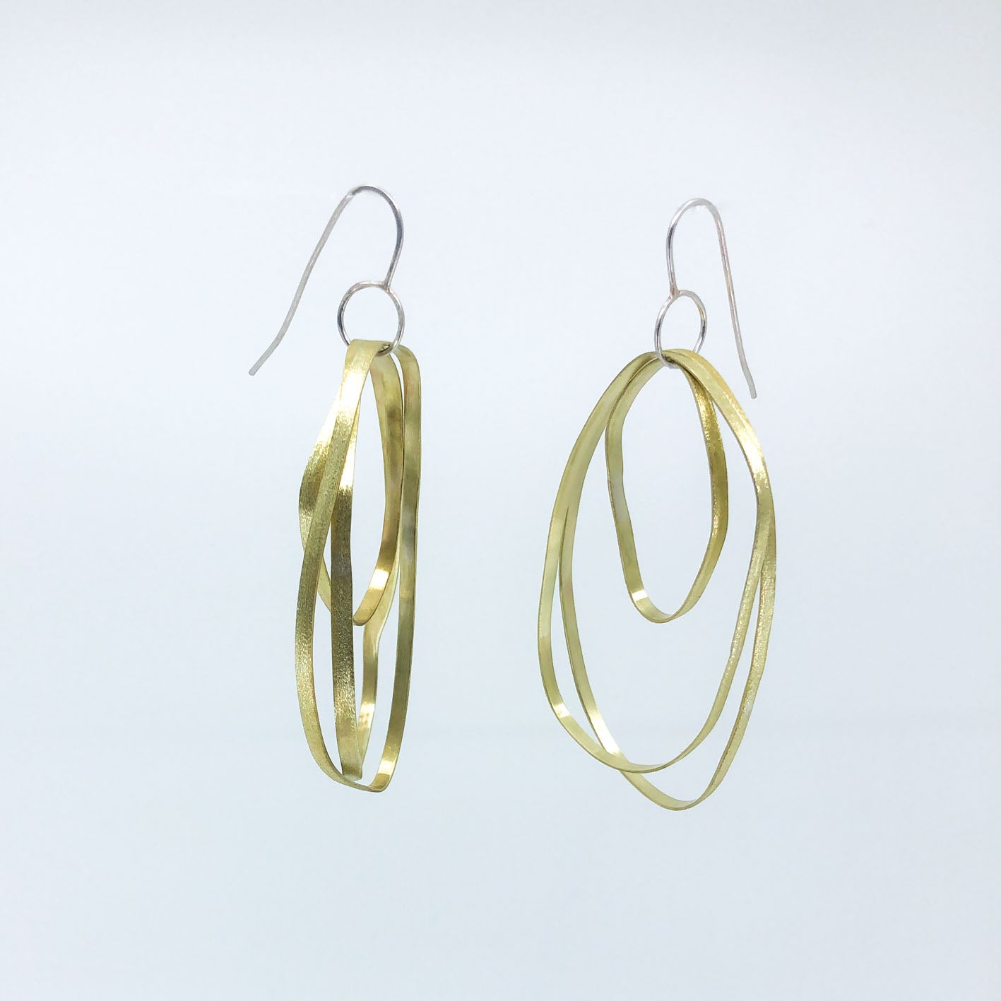 long dangling brass earrings with sterling silver hook • three textured free form elements