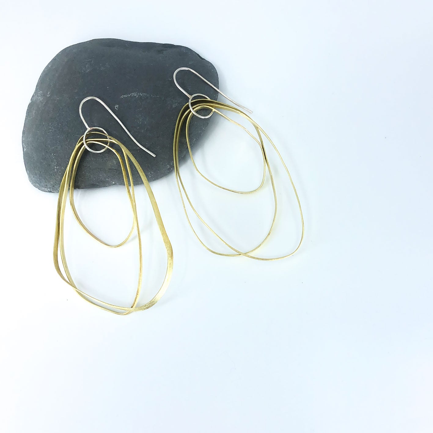 long dangling brass earrings with sterling silver hook • three textured free form elements