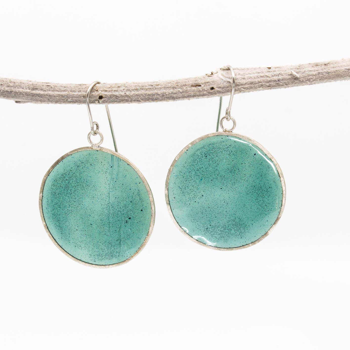 green dangling resin earrings in sterling silver