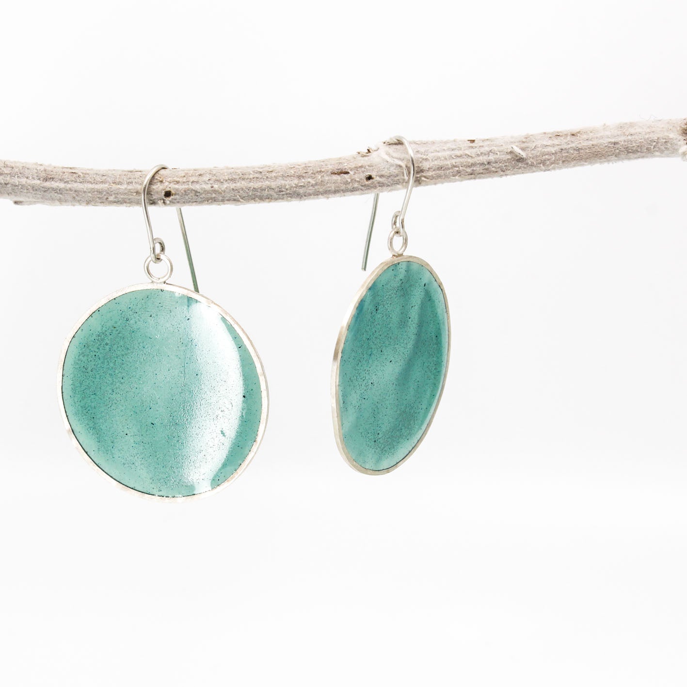 green dangling resin earrings in sterling silver